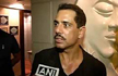 Vadra loses cool, snaps at a reporter; Digvijaya Defends Vadra